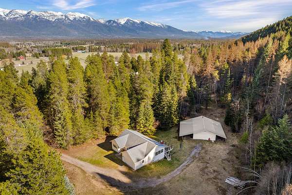 10 Acres of Land with Home for Sale in Bigfork, Montana