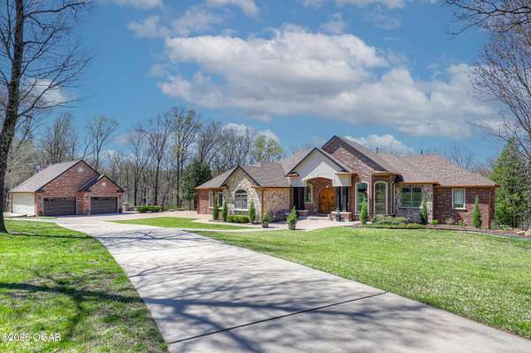 5 Acres of Land with Home for Sale in Joplin, Missouri