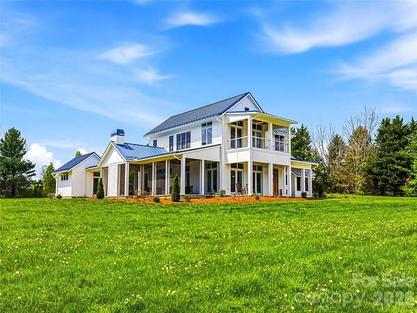 3.47 Acres of Land with Home for Sale in Fletcher, North Carolina