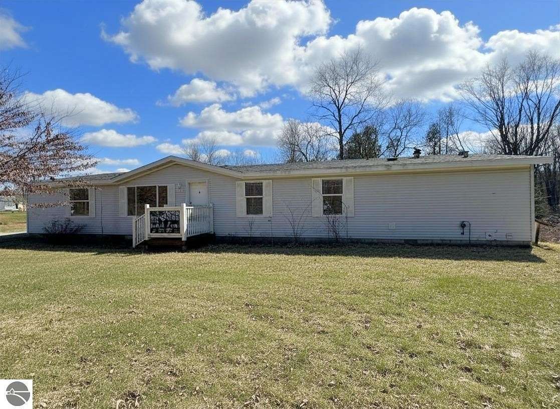 4.89 Acres of Land with Home for Sale in Clare, Michigan