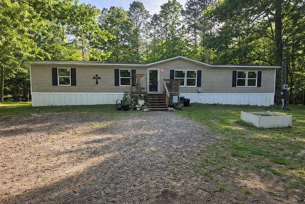 7 Acres of Land with Home for Sale in Deweyville, Texas