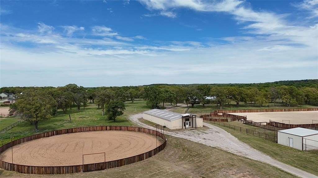 28 Acres of Agricultural Land with Home for Sale in Millsap, Texas