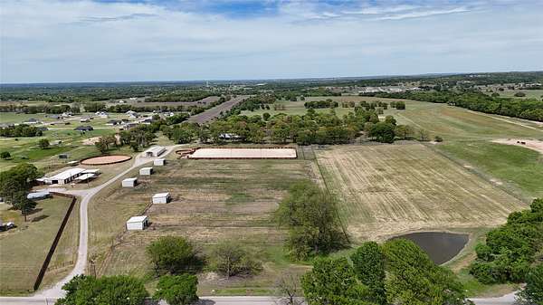 31.3 Acres of Agricultural Land with Home for Sale in Millsap, Texas