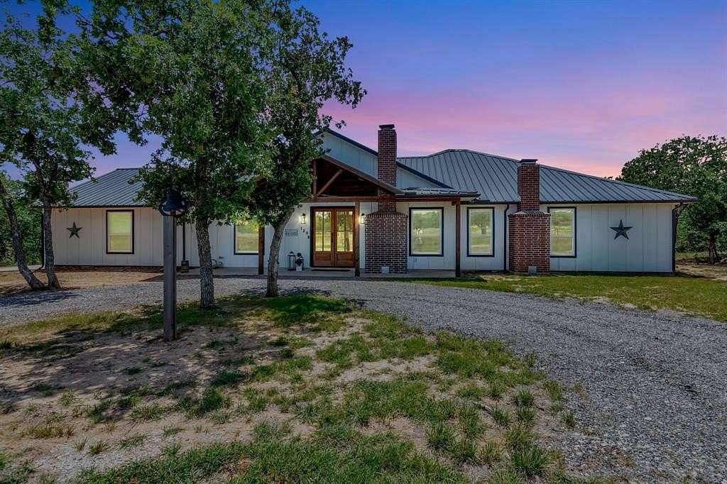 2 Acres of Land with Home for Sale in Runaway Bay, Texas