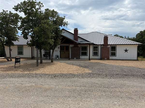 2 Acres of Land with Home for Sale in Runaway Bay, Texas