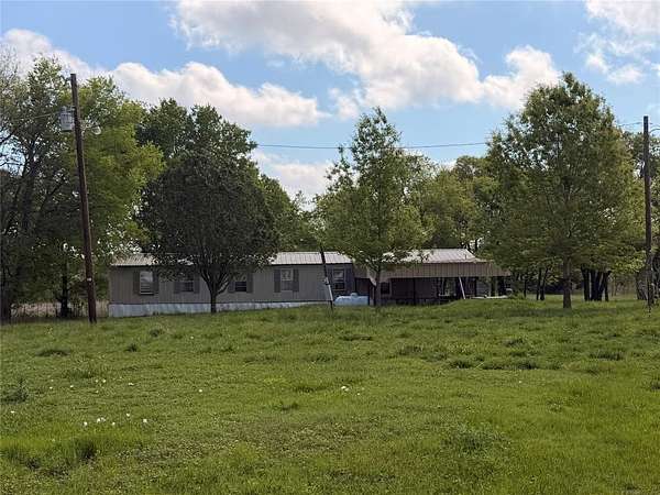 6.16 Acres of Land with Home for Sale in Paris, Texas