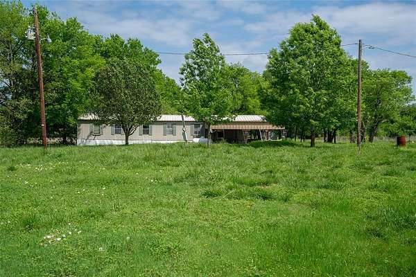 6.16 Acres of Land with Home for Sale in Paris, Texas