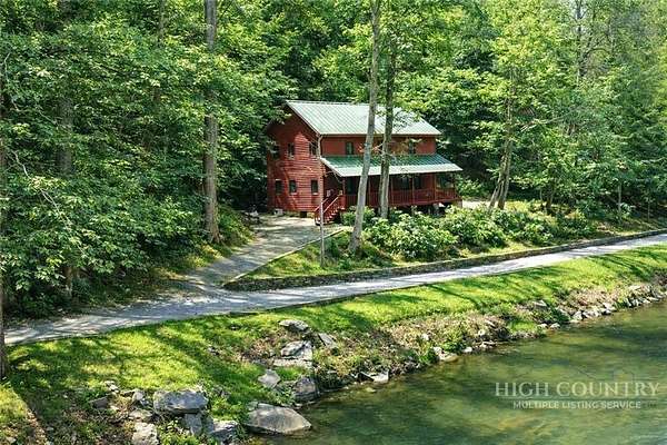 6.57 Acres of Land with Home for Sale in Sparta, North Carolina