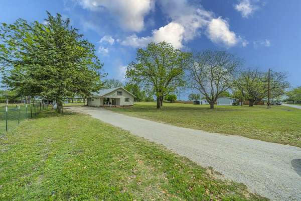 2.67 Acres of Land with Home for Sale in Newcastle, Texas