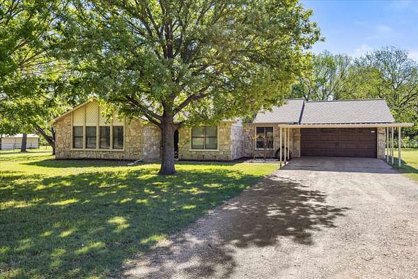 5.19 Acres of Land with Home for Sale in Springtown, Texas