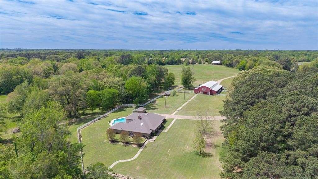 50 Acres of Agricultural Land with Home for Sale in Pittsburg, Texas