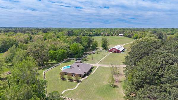 50 Acres of Recreational Land with Home for Sale in Pittsburg, Texas