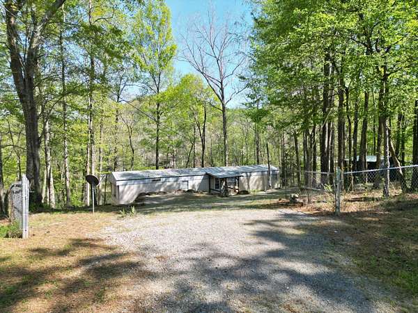 0.5 Acres of Land with Home for Sale in Crane Hill, Alabama