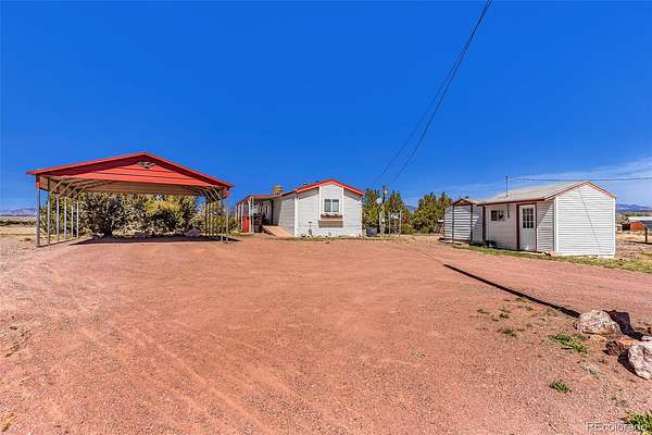 4.88 Acres of Land with Home for Sale in Penrose, Colorado