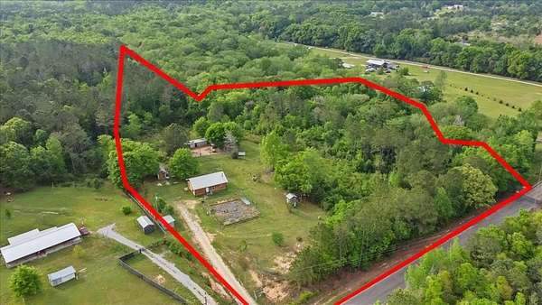 6.86 Acres of Land with Home for Sale in Ashford, Alabama