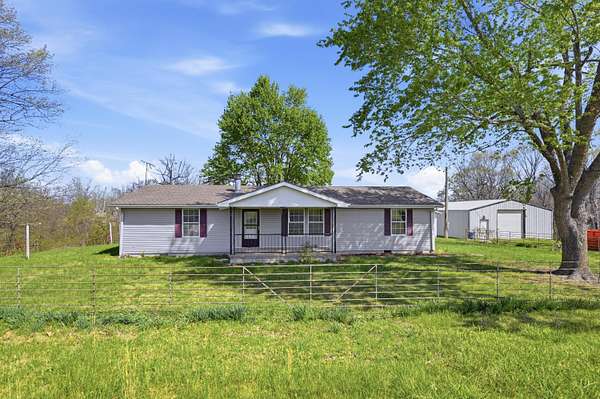 117 Acres of Land with Home for Sale in Stella, Missouri