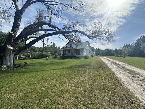 11.6 Acres of Land with Home for Sale in Fairview, Michigan