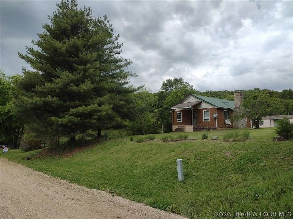 5 Acres of Land with Home for Sale in Gravois Mills, Missouri