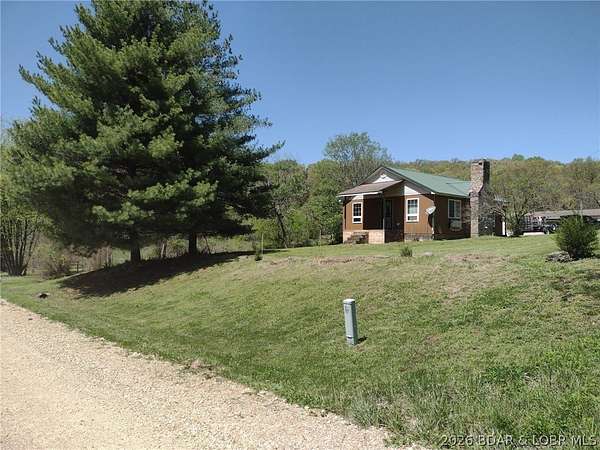 5 Acres of Land with Home for Sale in Gravois Mills, Missouri