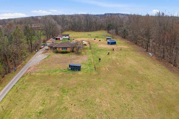 5 Acres of Land with Home for Sale in New Hudson, Michigan