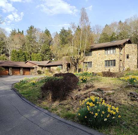 9 Acres of Land with Home for Sale in Bear Creek Township, Pennsylvania