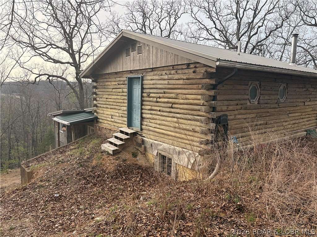 5 Acres of Land with Home for Sale in Lake Ozark, Missouri
