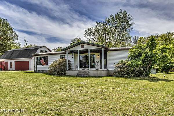 16 Acres of Land with Home for Sale in Ten Mile, Tennessee