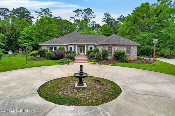 5.28 Acres of Land with Home for Sale in Kiln, Mississippi