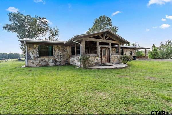 11.2 Acres of Land with Home for Sale in Hughes Springs, Texas