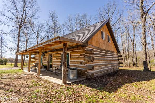 27 Acres of Land with Home for Sale in Aurora, Missouri