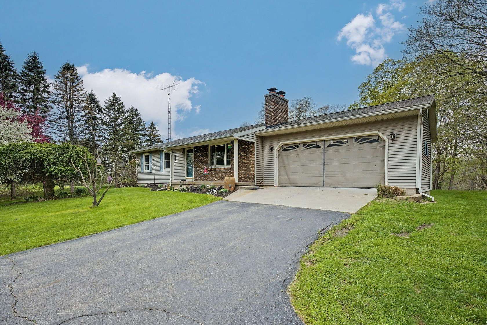 10 Acres of Recreational Land with Home for Sale in Bellevue, Michigan