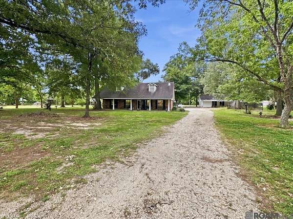 5.7 Acres of Land with Home for Sale in Denham Springs, Louisiana