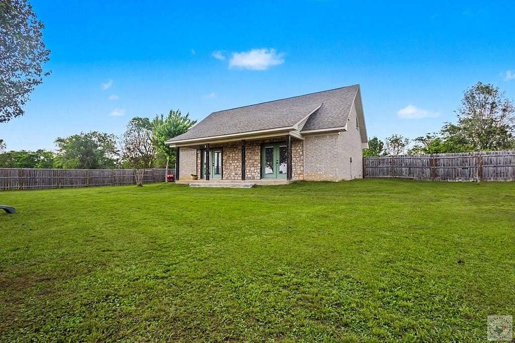 4.58 Acres of Land with Home for Sale in De Kalb, Texas