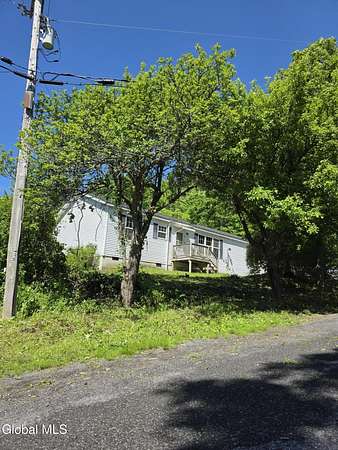 6.8 Acres of Land with Home for Sale in Warnerville, New York