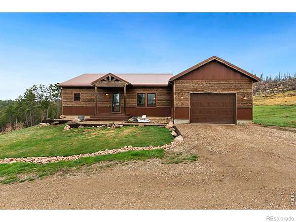 6.87 Acres of Land with Home for Sale in Bellvue, Colorado