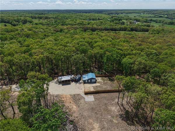 5 Acres of Land with Home for Sale in Stover, Missouri