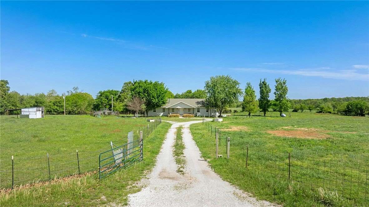 6.24 Acres of Land with Home for Sale in Goodman, Missouri