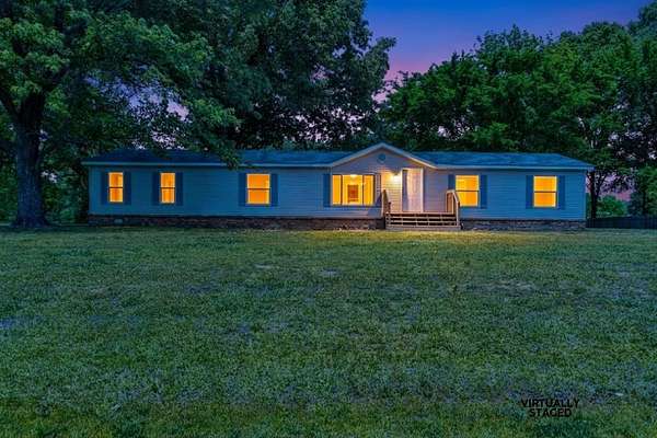 2.29 Acres of Land with Home for Sale in Oakland, Tennessee