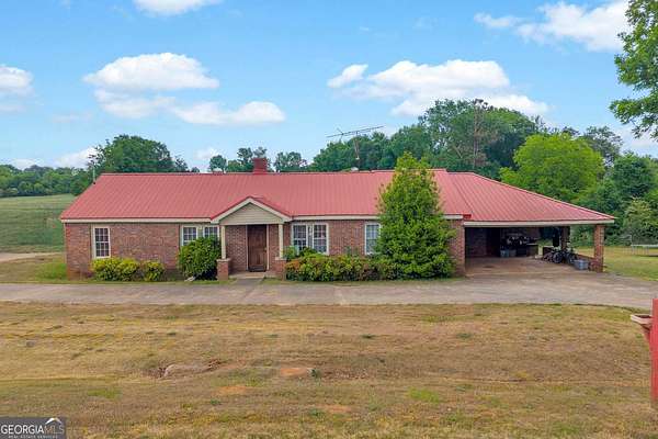 57.1 Acres of Agricultural Land with Home for Sale in Royston, Georgia