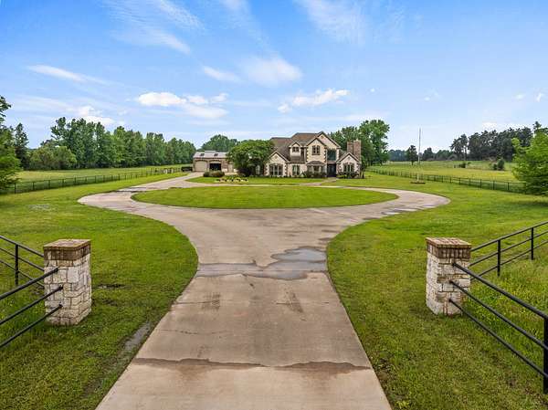 25 Acres of Land with Home for Sale in Pittsburg, Texas