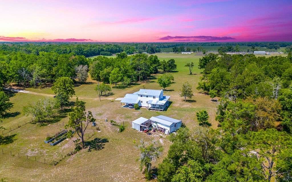 10 Acres of Land with Home for Sale in McAlpin, Florida