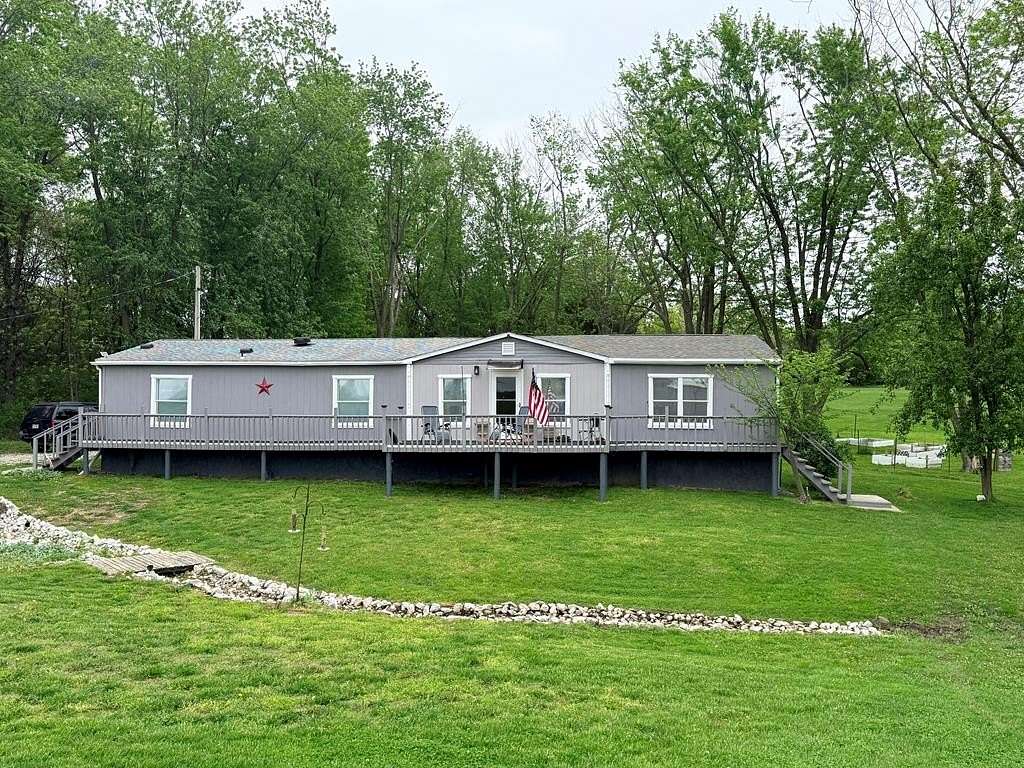 3.2 Acres of Land with Home for Sale in Moberly, Missouri