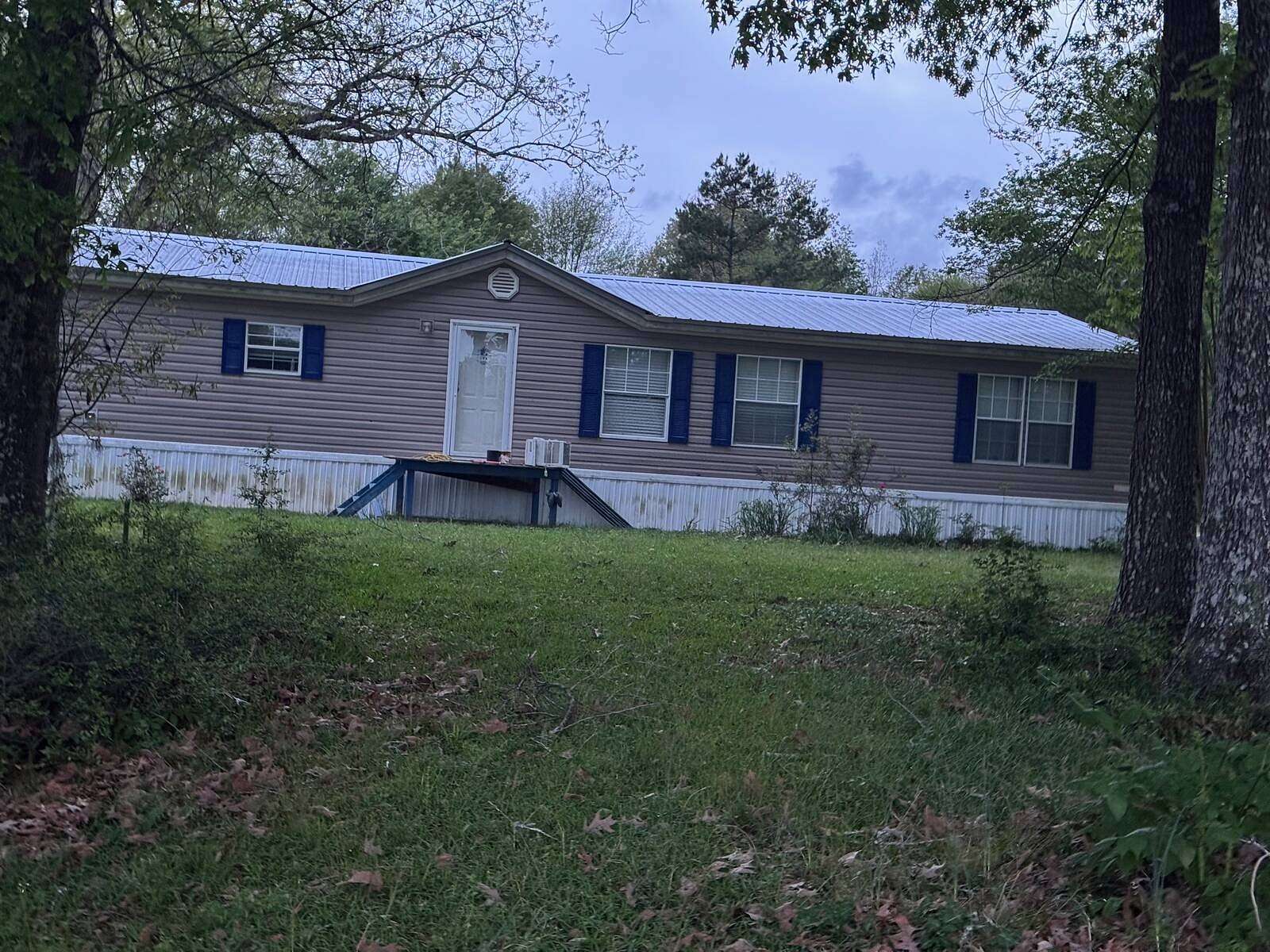 10.5 Acres of Land with Home for Sale in Sandy Hook, Mississippi