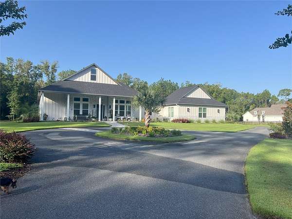 7.26 Acres of Land with Home for Sale in Alachua, Florida