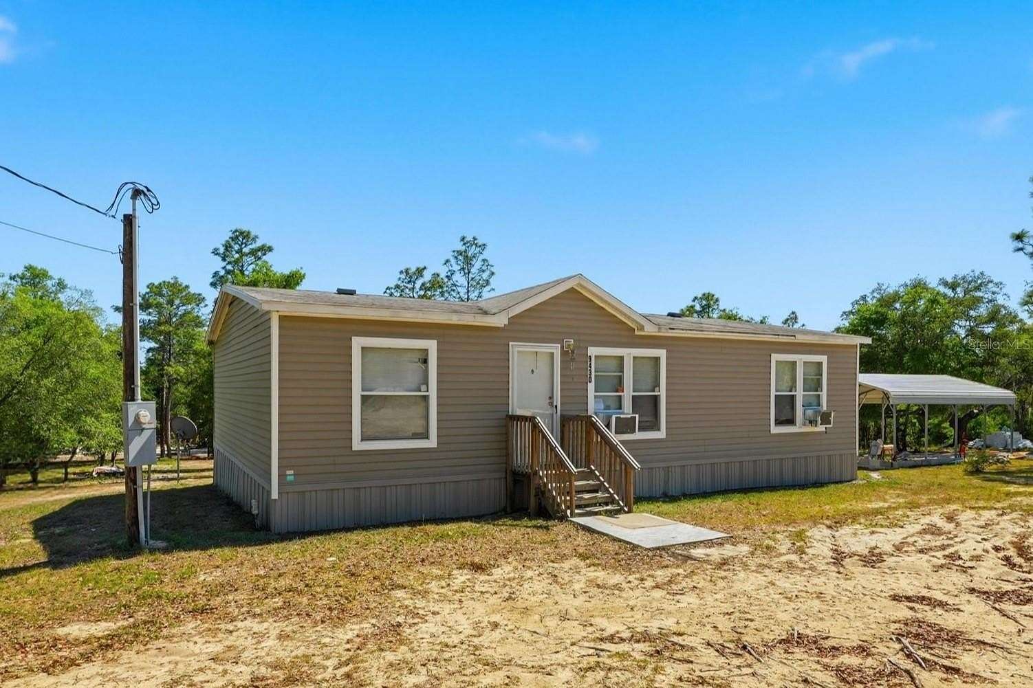 2.5 Acres of Land with Home for Sale in Bronson, Florida