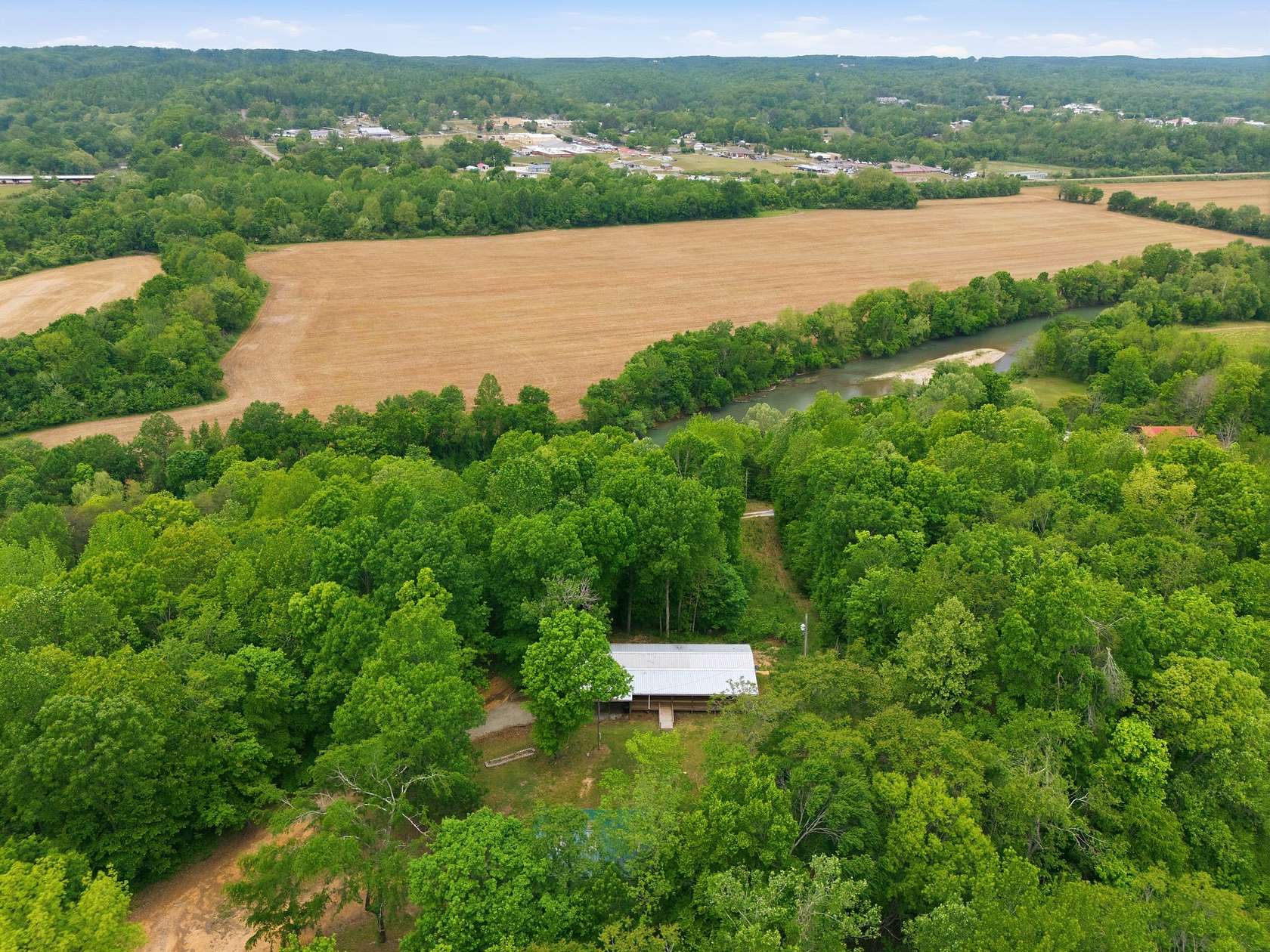 9.26 Acres of Land with Home for Sale in Linden, Tennessee