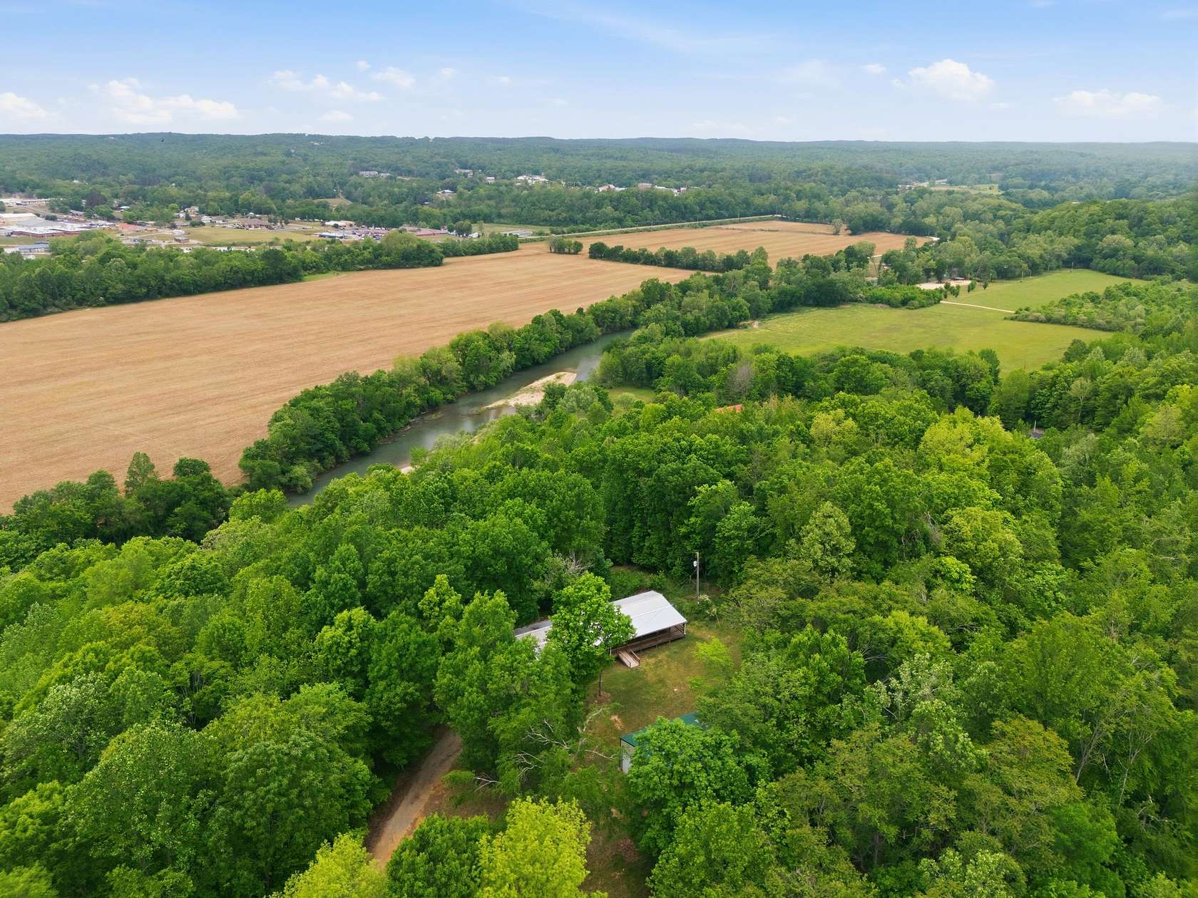 9.26 Acres of Land with Home for Sale in Linden, Tennessee