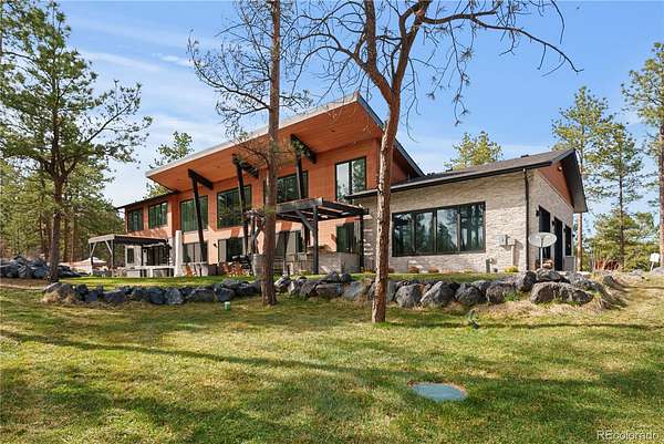 4.58 Acres of Land with Home for Sale in Larkspur, Colorado