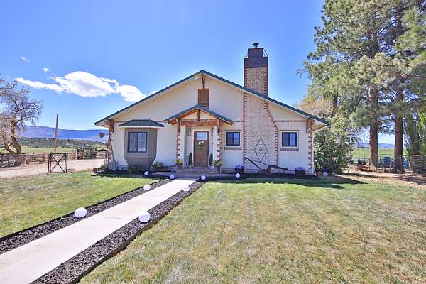 163 Acres of Land with Home for Sale in Collbran, Colorado