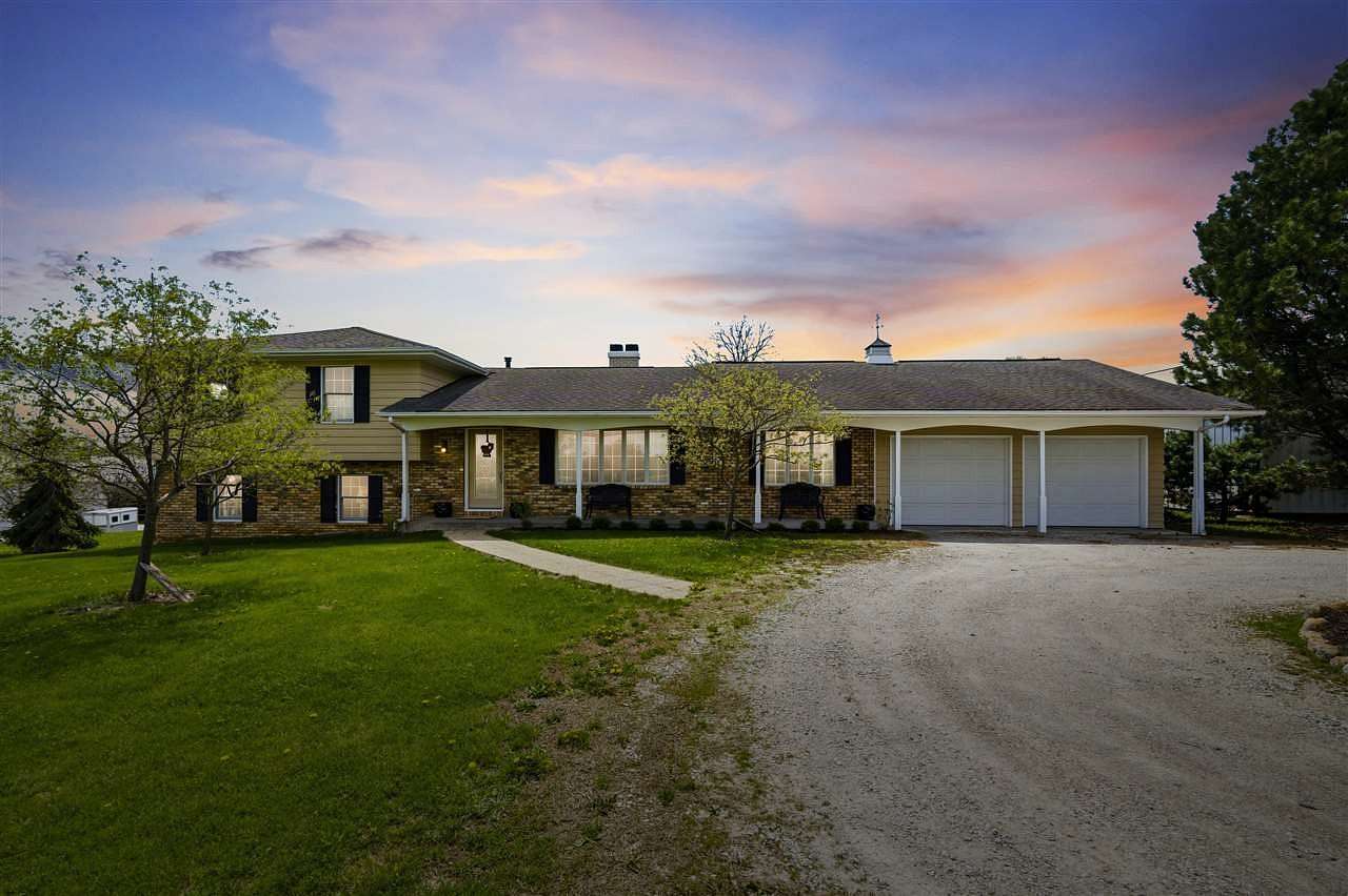19 Acres of Land with Home for Sale in Scott Township, Iowa